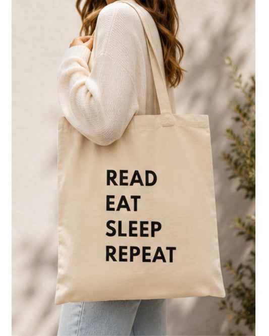 Read, Eat, Sleep, Repeat Tote Bag